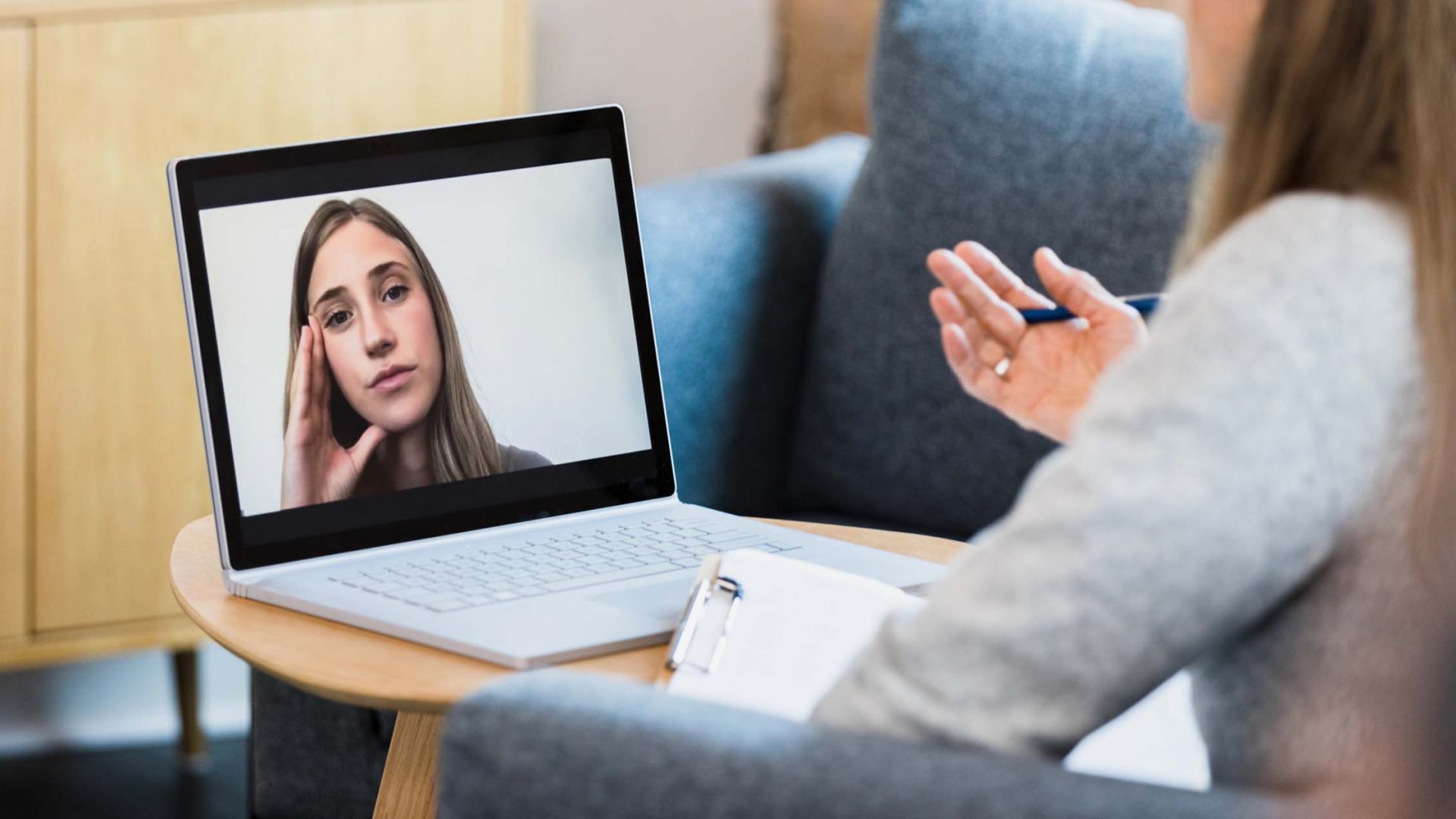 Physician Conducts Telepsychiatry Visit