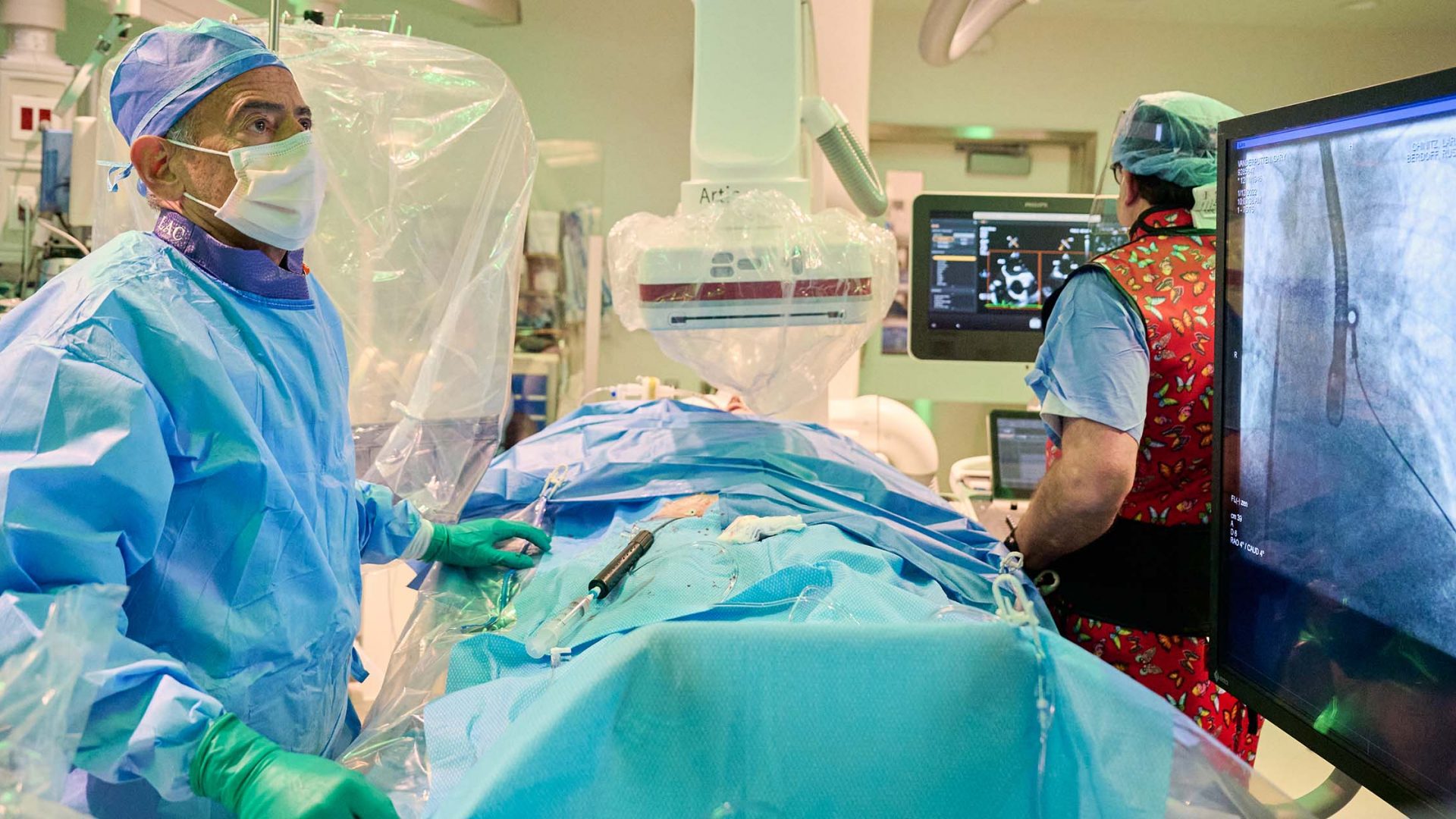 Dr. Larry Chinitz Viewing Screen During Catheter-Based Procedure in Operating Room