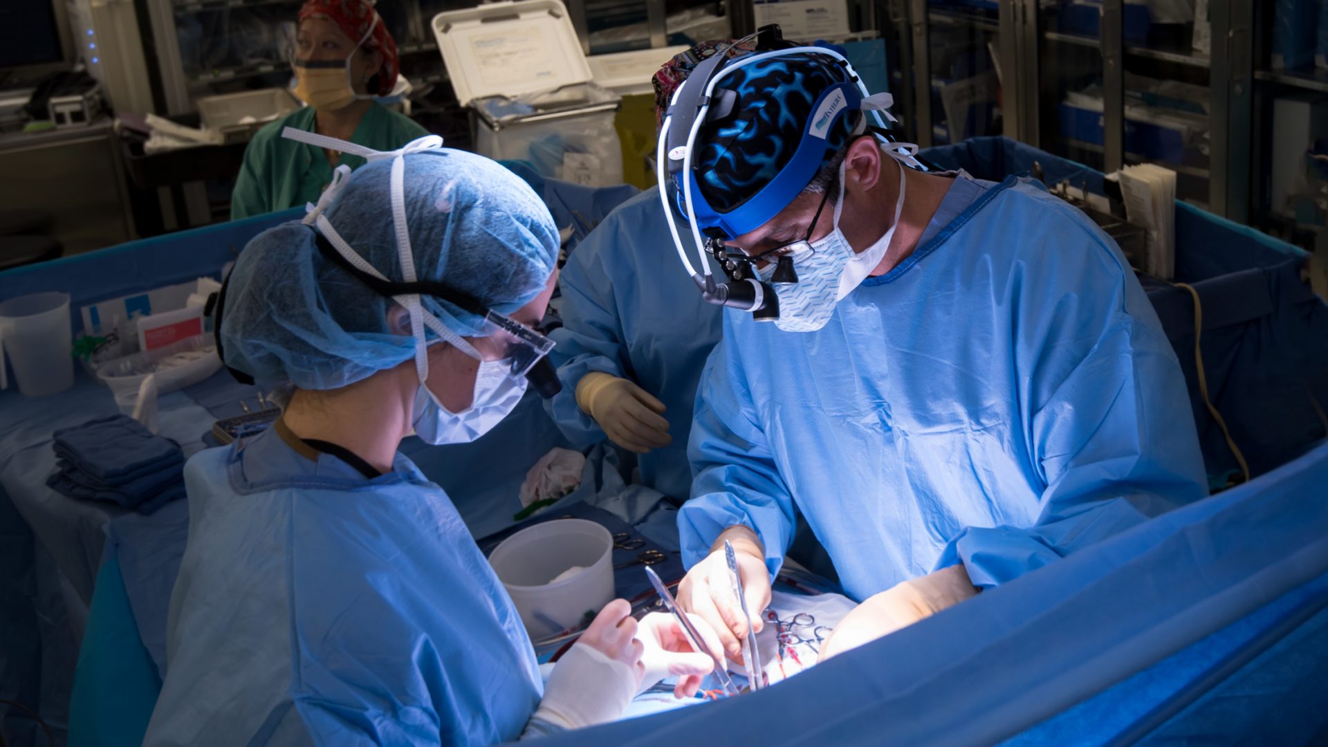 Dr. Ralph S. Mosca and Team Performing Surgery in Operating Room