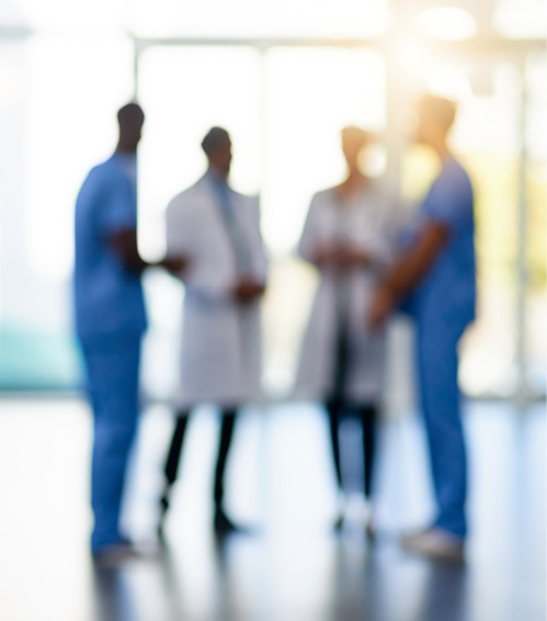 Doctors speaking in hallway