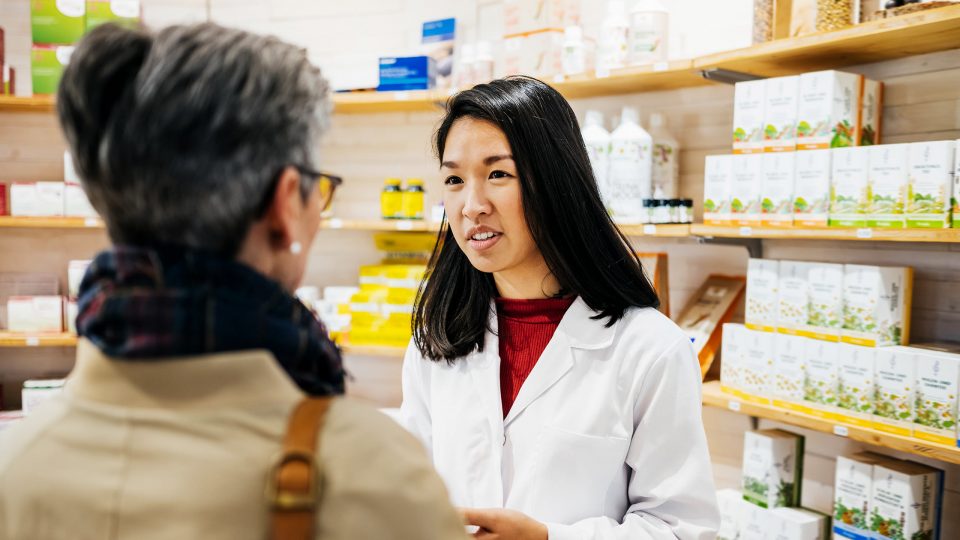 Pharmacist Speaking with Patient