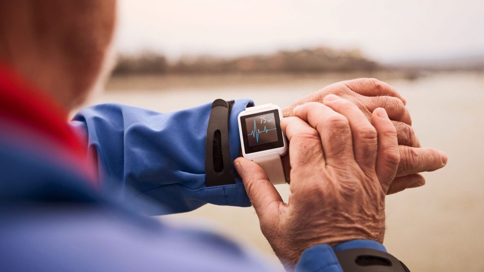Older Adult Looking at Their Heart Rate Displayed on a Smartwatch