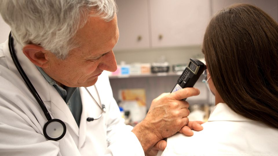 Doctor Examining Patient’s Ear