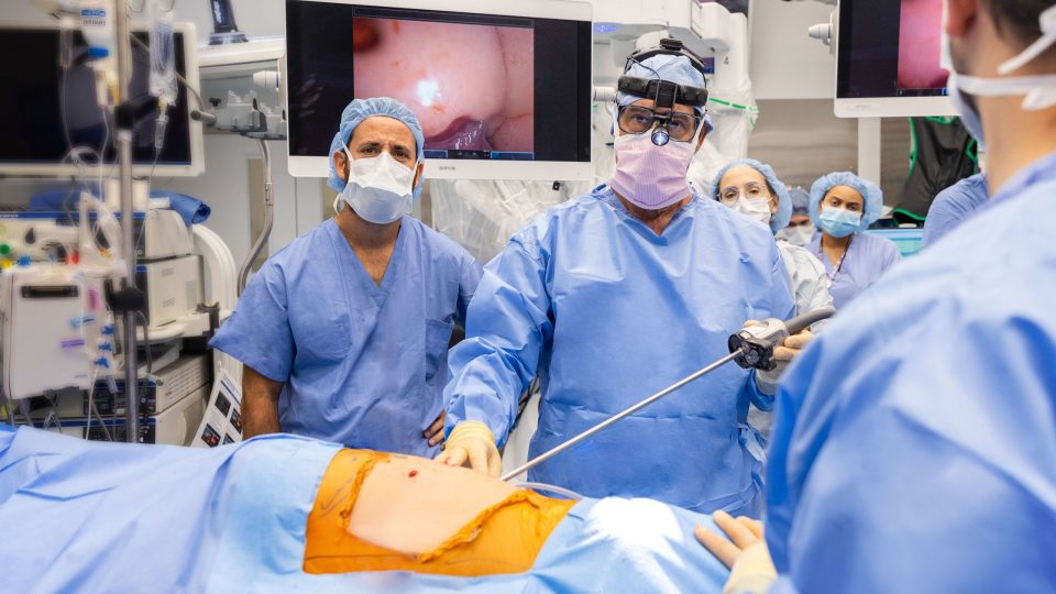 Dr. Jason C. Fisher, Dr. Robert J. Cerfolio, and Team Performing Thoracic Surgery for Pediatric Patient