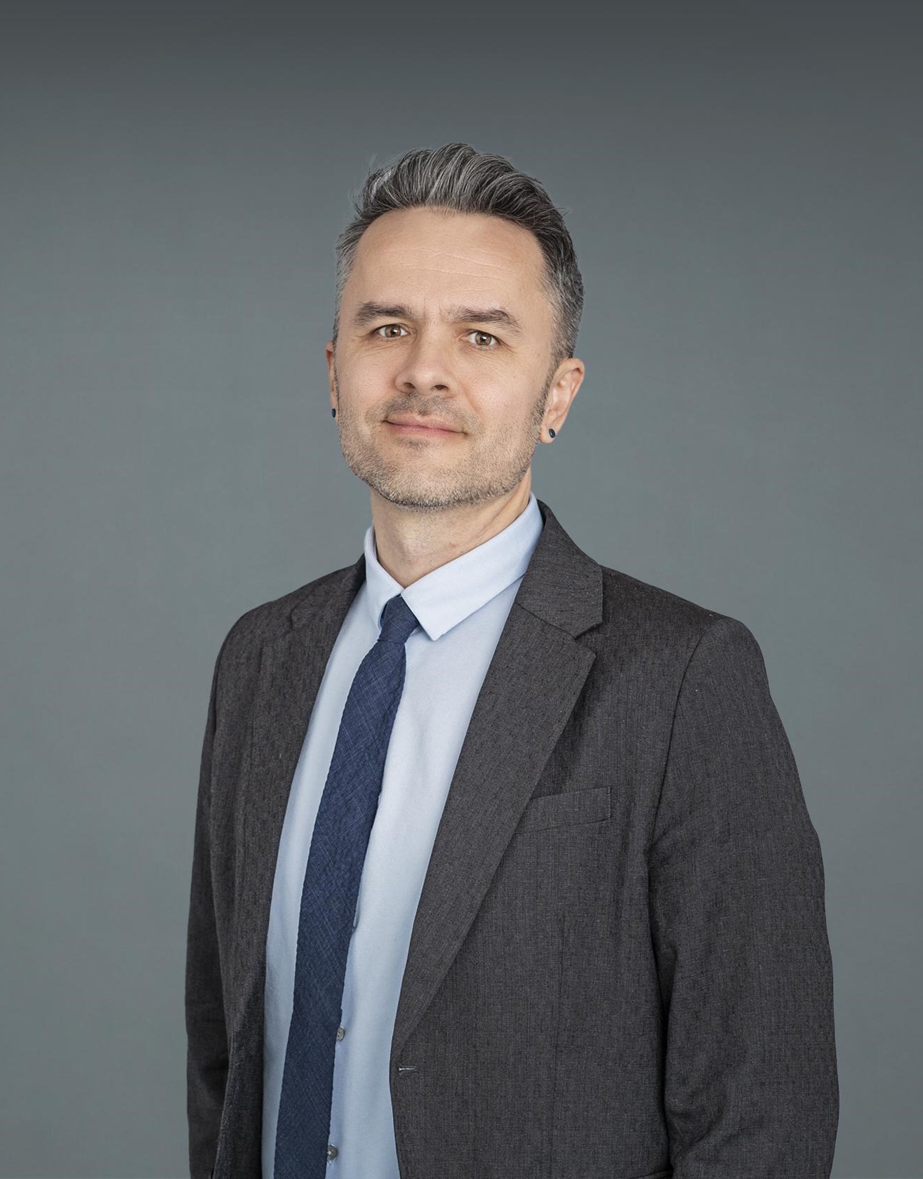 Dr. Marcin Imielinski